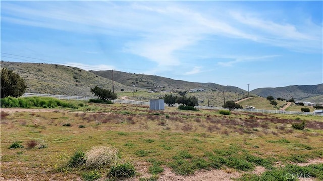 view of mountain feature featuring a rural view