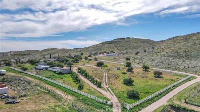 view of mountain feature with a rural view