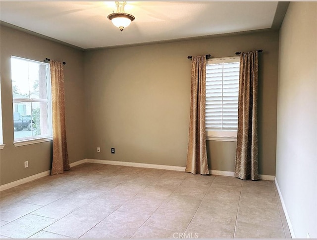 view of tiled empty room