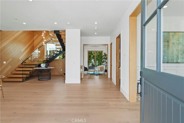 foyer with light hardwood / wood-style floors