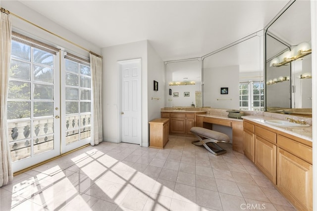 bathroom with tile patterned floors and vanity