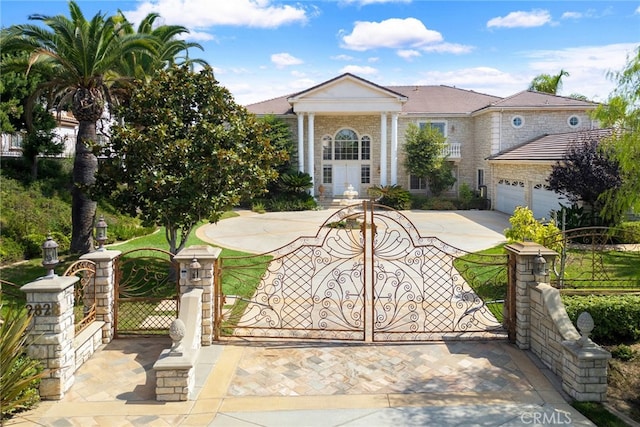 view of front of home with a garage