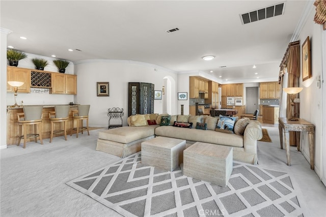 living room featuring ornamental molding