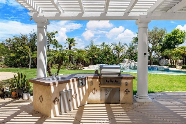 view of patio / terrace with a pergola, area for grilling, and a swimming pool