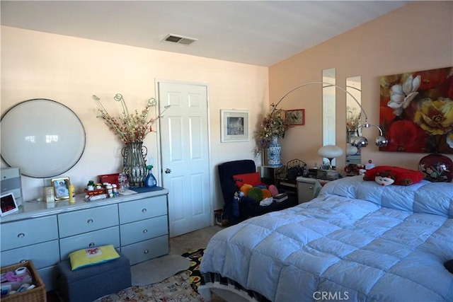 bedroom with light carpet