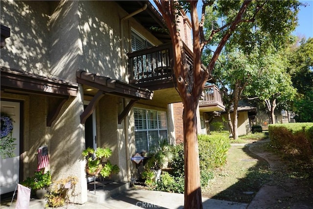 exterior space featuring a balcony