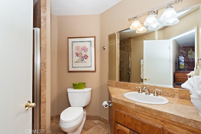 bathroom with walk in shower, tile patterned floors, vanity, and toilet