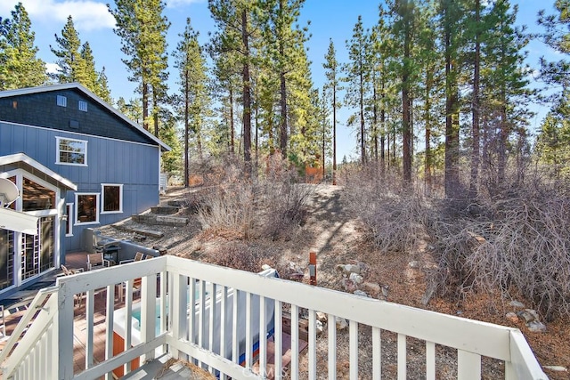 wooden balcony featuring a deck