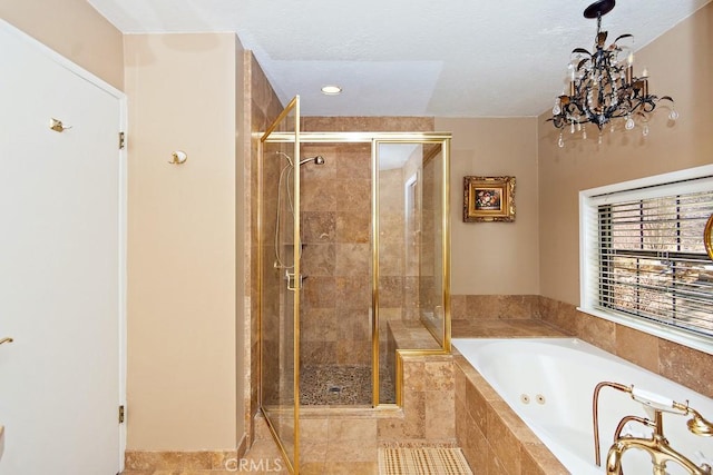 bathroom with separate shower and tub and tile patterned flooring