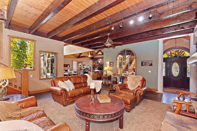 living room with carpet flooring, ceiling fan, beamed ceiling, and wooden ceiling