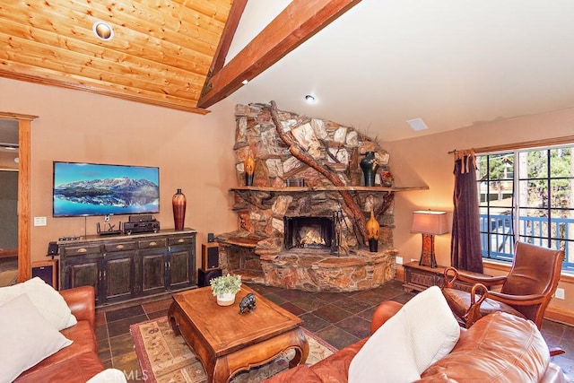 living room with a stone fireplace, wooden ceiling, dark tile patterned floors, and lofted ceiling with beams