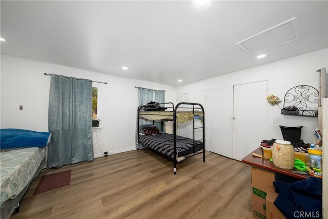 bedroom featuring hardwood / wood-style floors