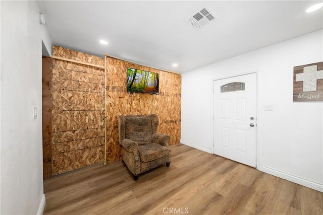 sitting room featuring hardwood / wood-style floors