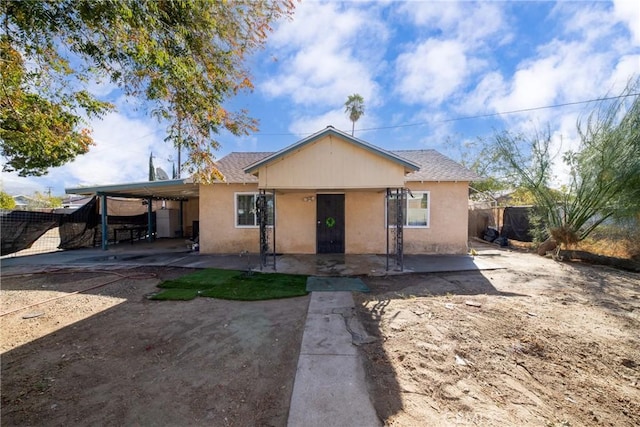 view of front of house with a carport