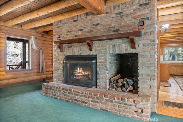 interior details featuring carpet floors, a brick fireplace, and wood ceiling