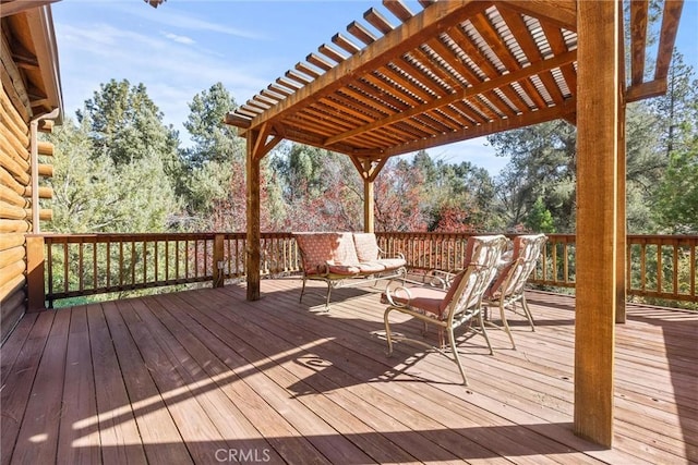 wooden deck featuring outdoor lounge area and a pergola