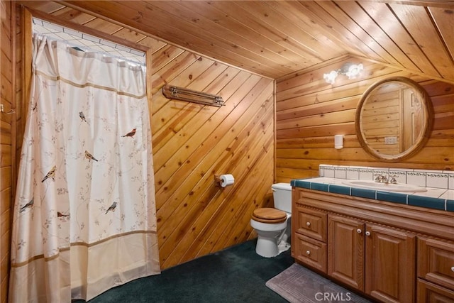 full bathroom with vanity, toilet, a shower with shower curtain, wooden walls, and wood ceiling