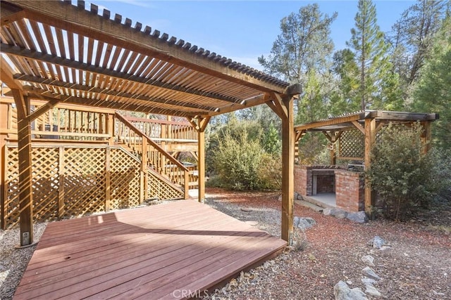 deck with a pergola and stairs