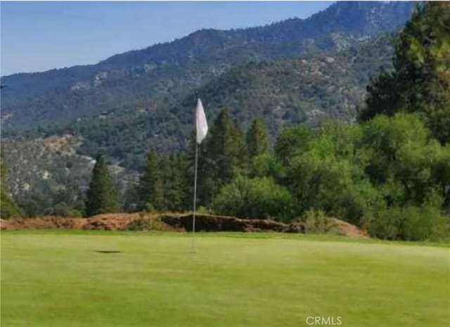surrounding community with a mountain view