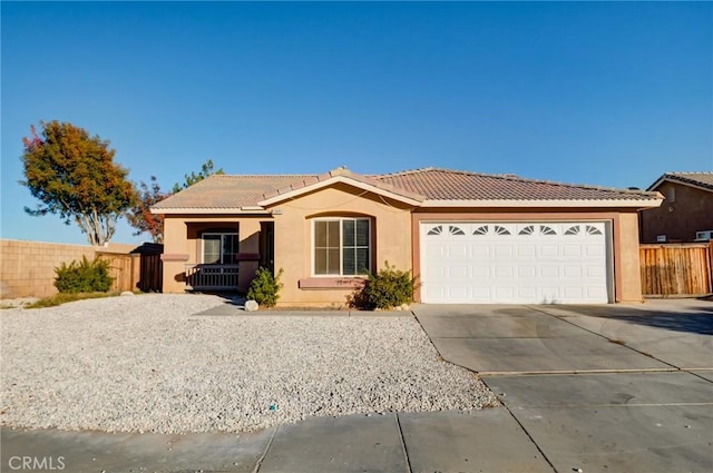 ranch-style home featuring a garage