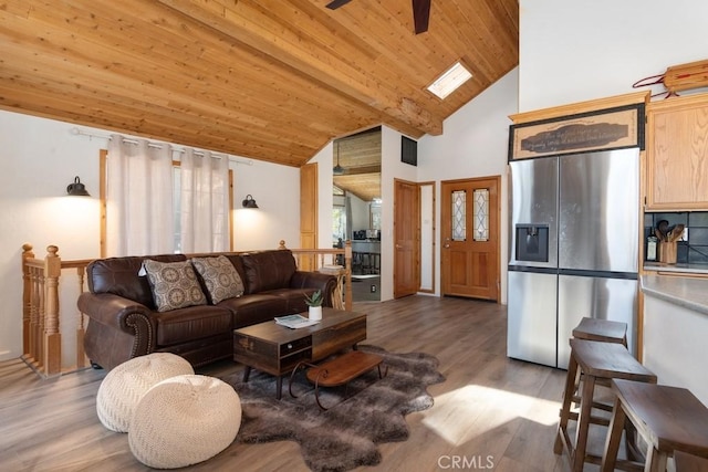 living room featuring ceiling fan, dark hardwood / wood-style flooring, wooden ceiling, and high vaulted ceiling