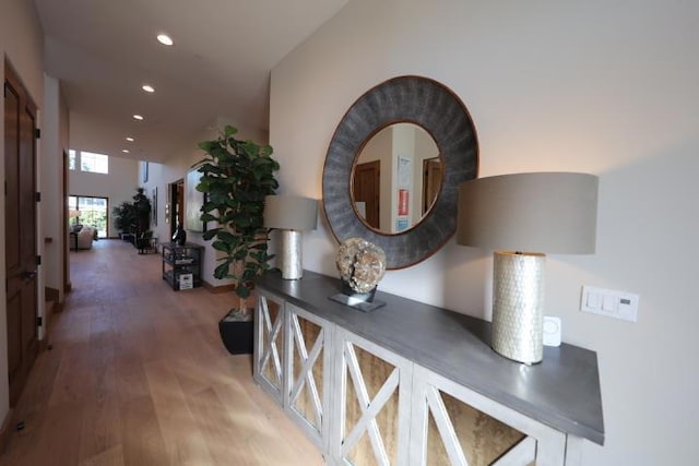 corridor featuring hardwood / wood-style floors