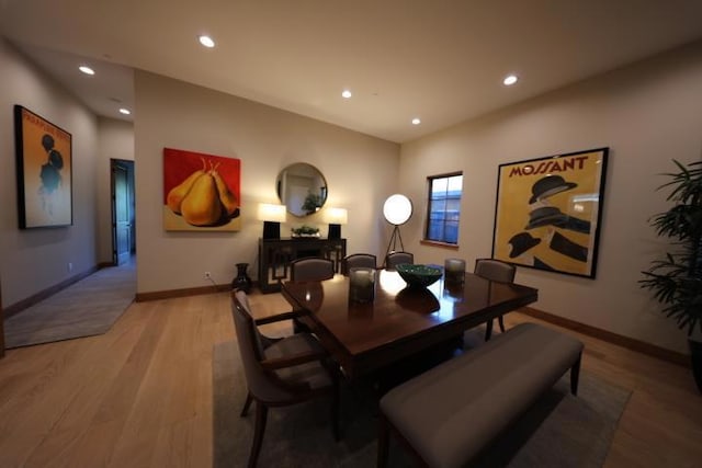 dining space featuring hardwood / wood-style floors