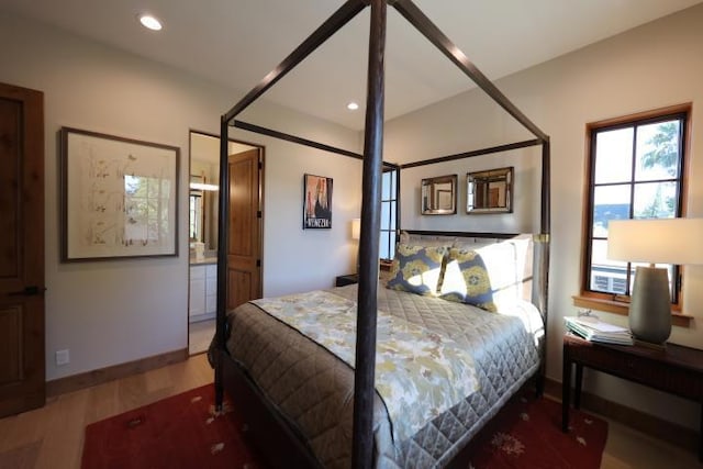 bedroom featuring hardwood / wood-style flooring