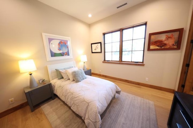 bedroom with light hardwood / wood-style flooring