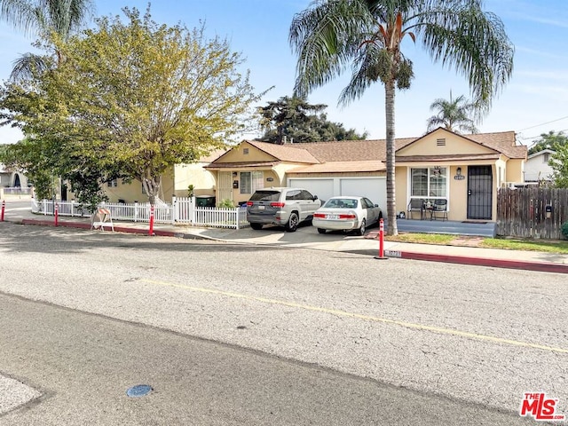 view of front of property with a garage