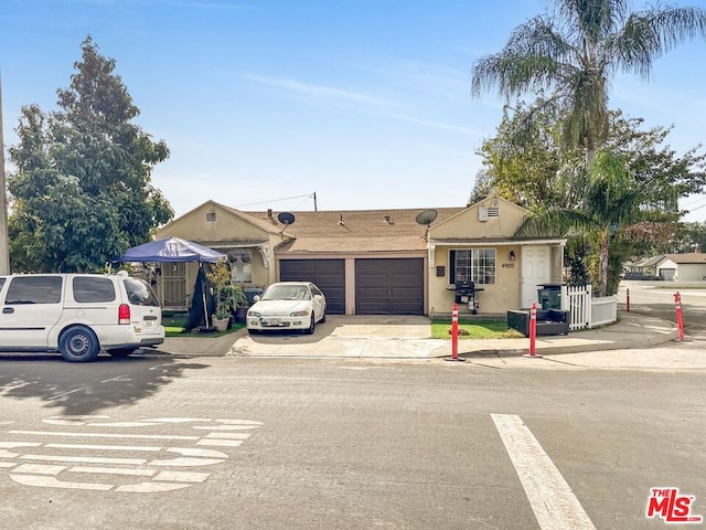 ranch-style house featuring a garage