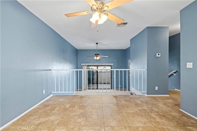 unfurnished room featuring ceiling fan