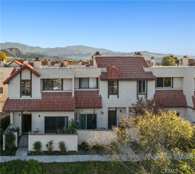 exterior space with a mountain view