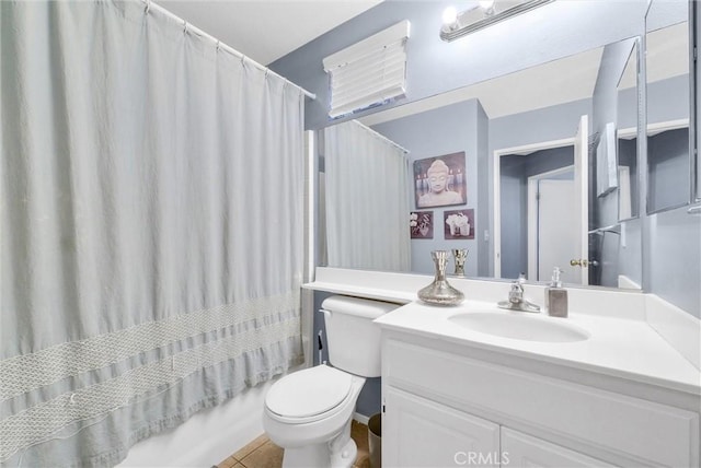 full bathroom with tile patterned floors, vanity, toilet, and shower / bathtub combination with curtain