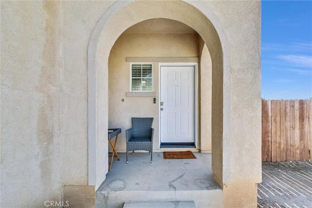 doorway to property featuring a patio