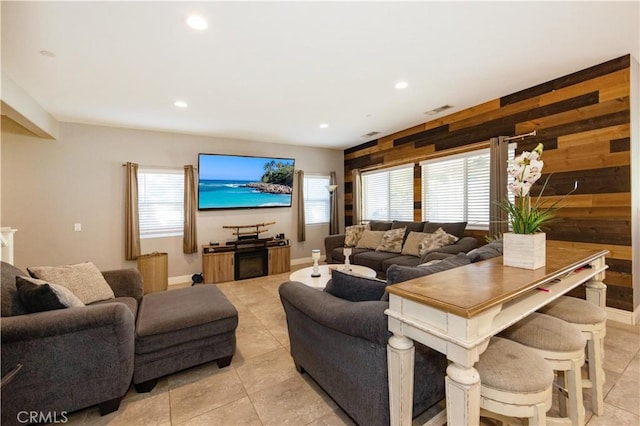 tiled living room with wooden walls