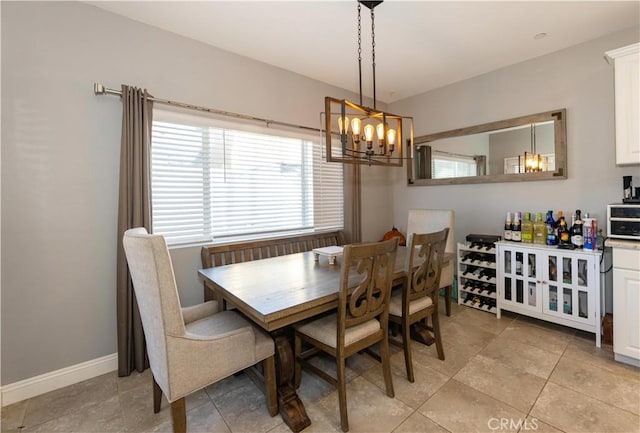 dining space with light tile patterned floors