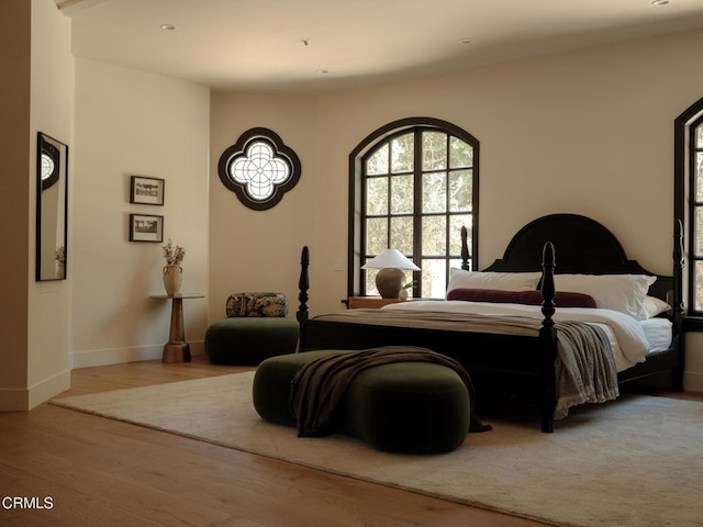 bedroom with light hardwood / wood-style flooring