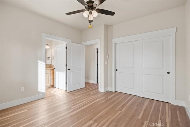 unfurnished bedroom with a closet, light hardwood / wood-style floors, and ceiling fan