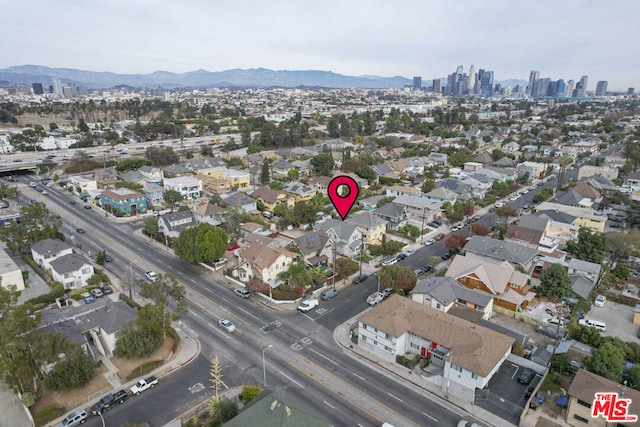 drone / aerial view featuring a mountain view