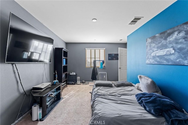 carpeted bedroom with radiator heating unit