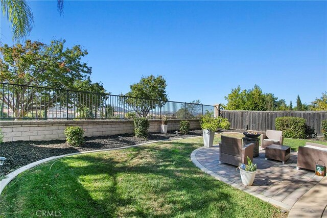 view of yard with a patio area and an outdoor hangout area