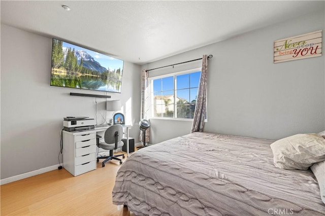 bedroom featuring light hardwood / wood-style floors