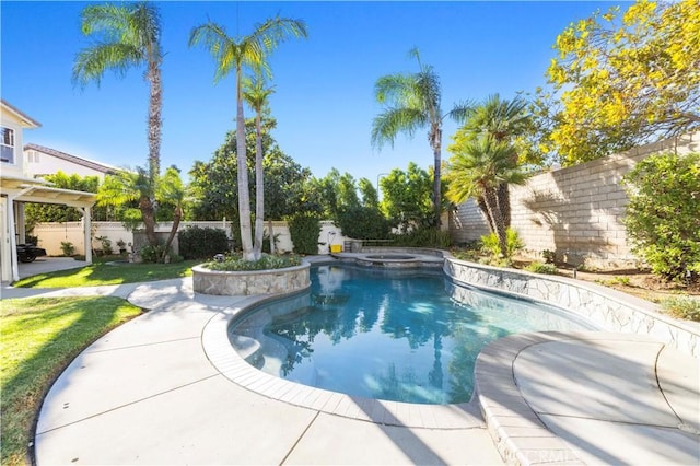 view of pool with an in ground hot tub and a patio area