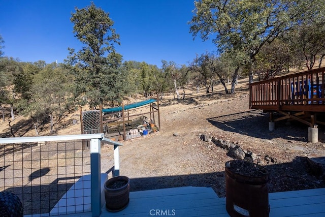 view of yard with a deck