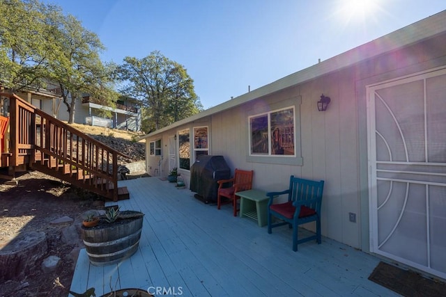 wooden terrace with grilling area