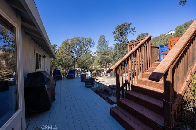 wooden terrace with grilling area