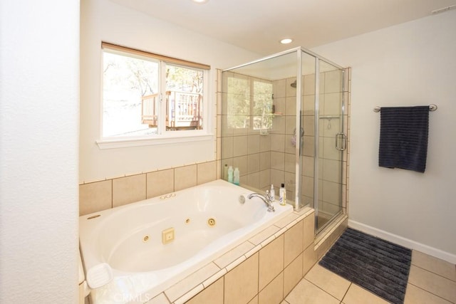 bathroom featuring plus walk in shower and tile patterned floors