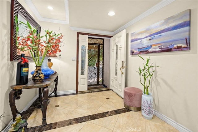 entryway featuring tile patterned flooring and crown molding