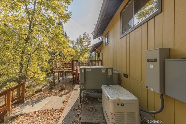 view of property exterior with a deck